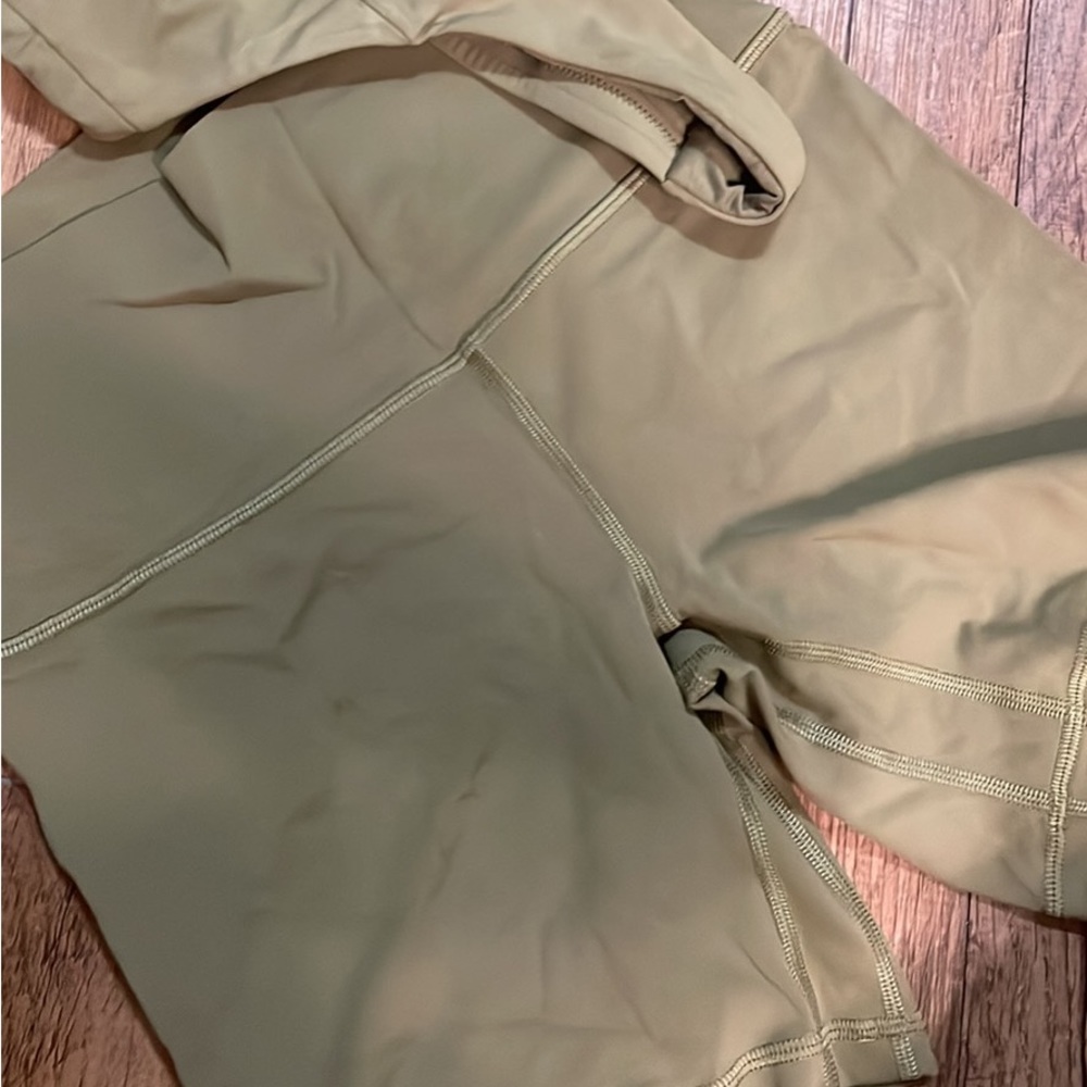 Lululemon size 6 sports bra and biker shorts set, olive green